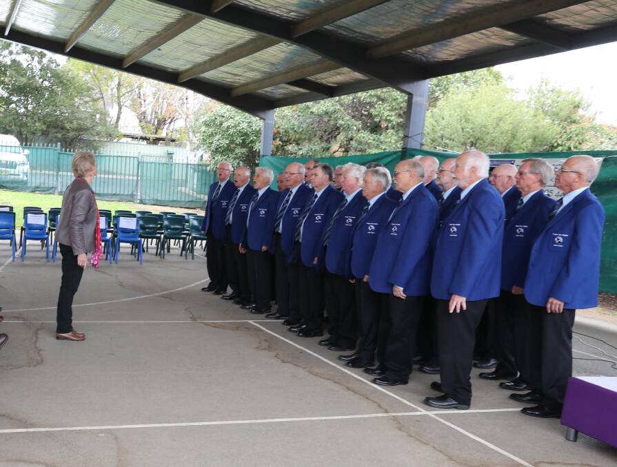 ON SONG: Members of the Wagga City Rugby Male Choir, directed by Judy Ferguson, perform at the official opening of the extension at The Bidgee School.