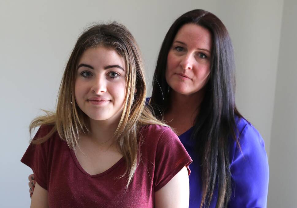 THERAPY PLAN: Kayla Burch, 14, and her mother Penelope. Kayla suffers a medical condition which could be helped by treatment in the USA. Picture: Les Smith