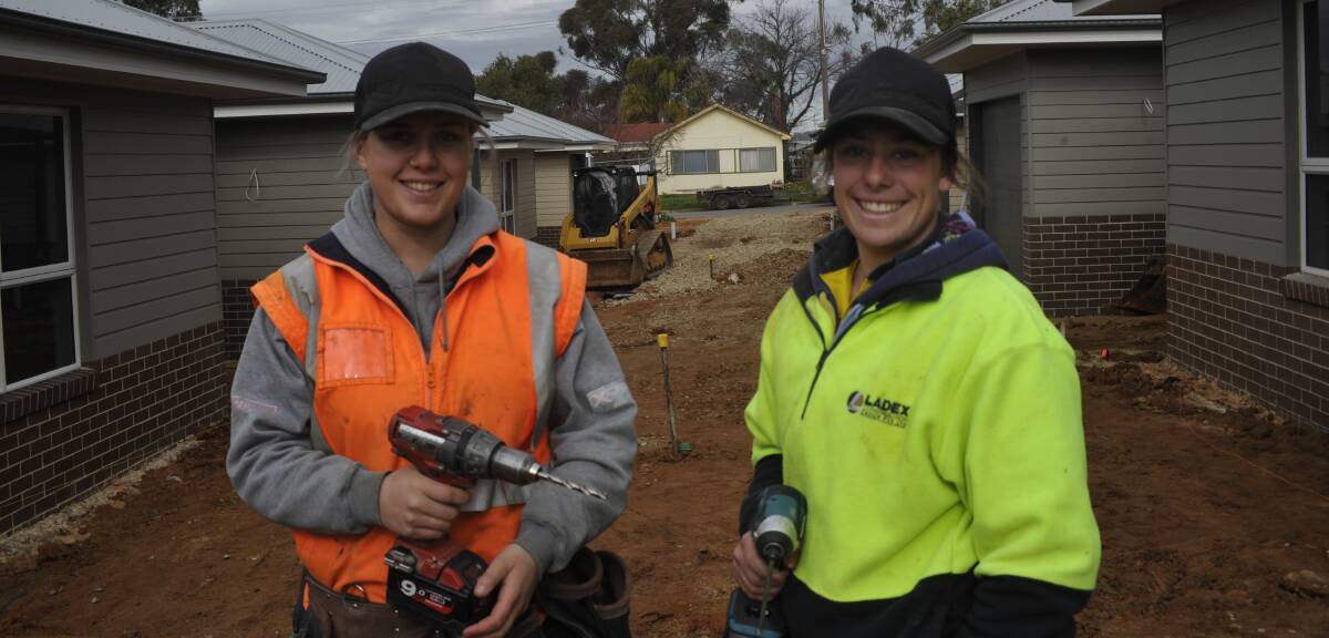 Natalie Creed and Grace Di Trapani on a Wagga construction site.