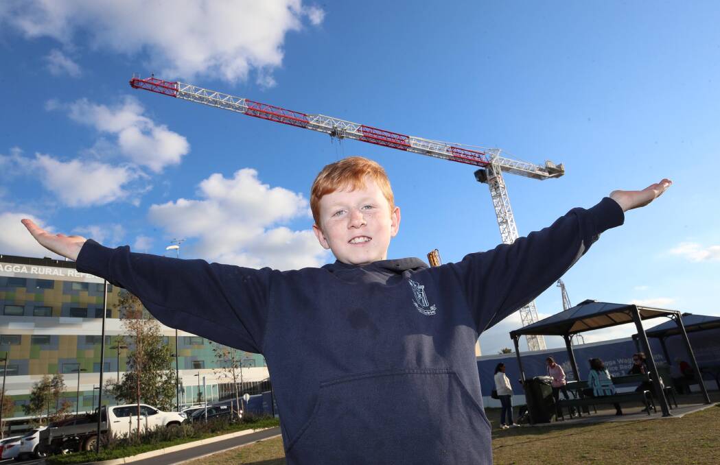 The crane above Wagga Base Hospital is going to be dubbed Wama-rra, after Hamish Wilkinson, 10, won a competition to give it a name. Picture: Les Smith