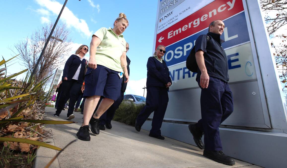 STOP WORK: About a dozen Wagga Base Hospital rallied on Wednesday in support of statewide stop-work action by the Health Services Union.