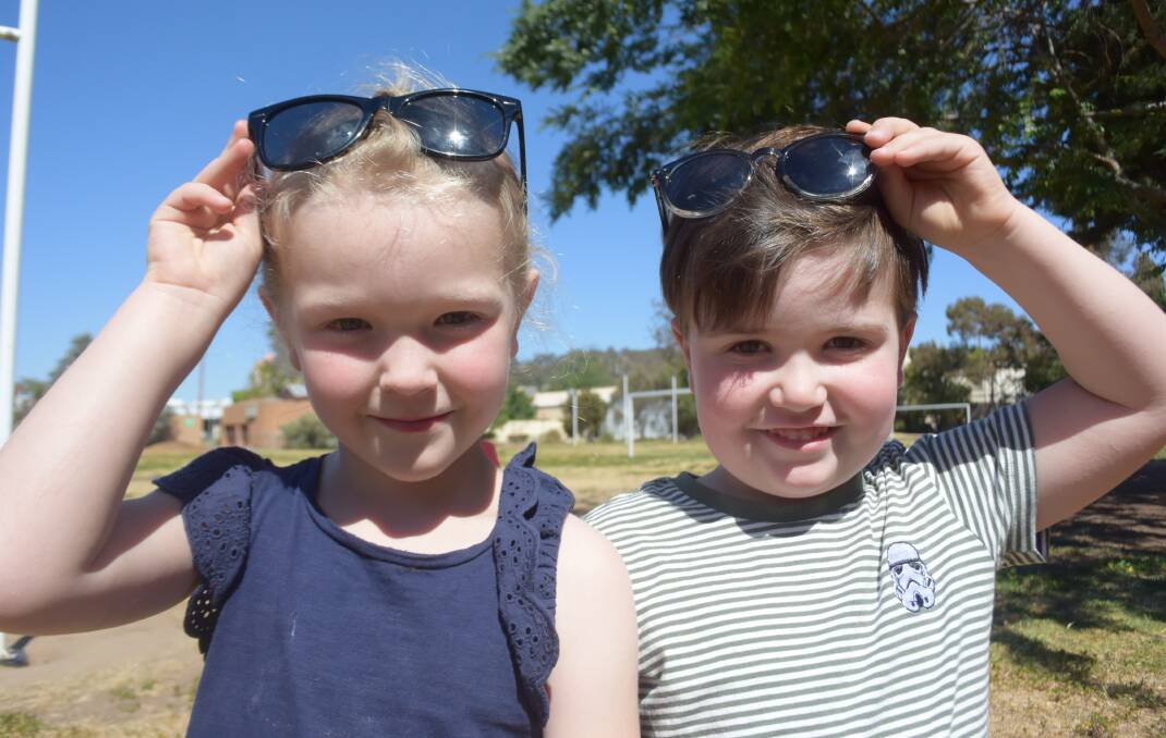 SUNNY DAYS: Chloe Burman, 5, and Walker Morgan, 4, have their sunglasses at the ready as the temperature rises, and heads towards a predicted maximum on Thursday of 35 degrees. Picture: Jody Lindbeck