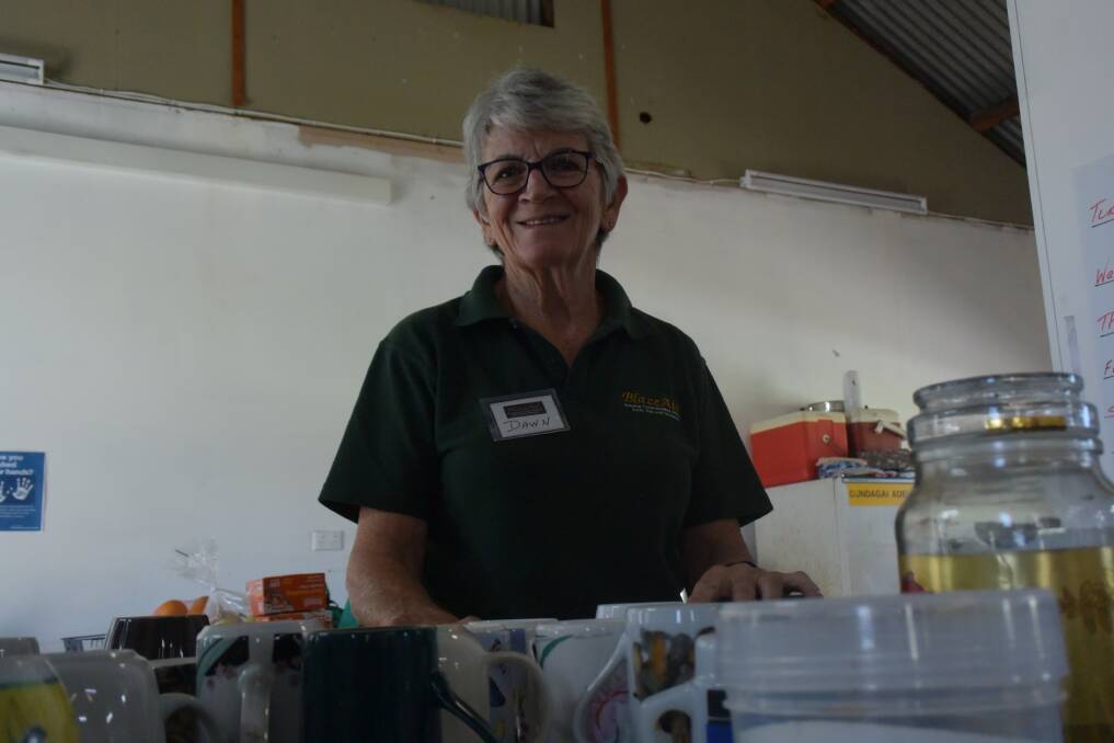 CARING: Dawn Gaspert travelled from the Sunshine Coast to lend a hand.