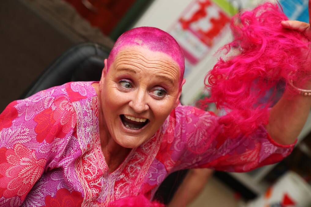 AND GONE: Kym Mather has shaved her head after promising to lose her bright pink locks to help charity. Picture: Emma Hillier