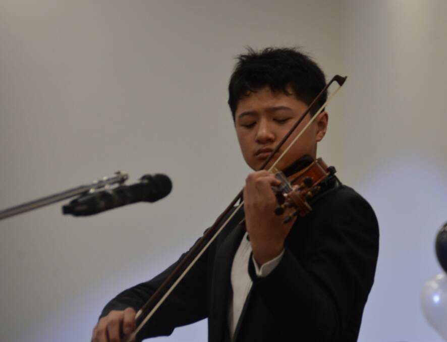 WAGGA PERFORMANCE: Teenage violinist Leon Fei, who has performed all over the world, brought his music to Wagga for a Rotary fund-raising event.