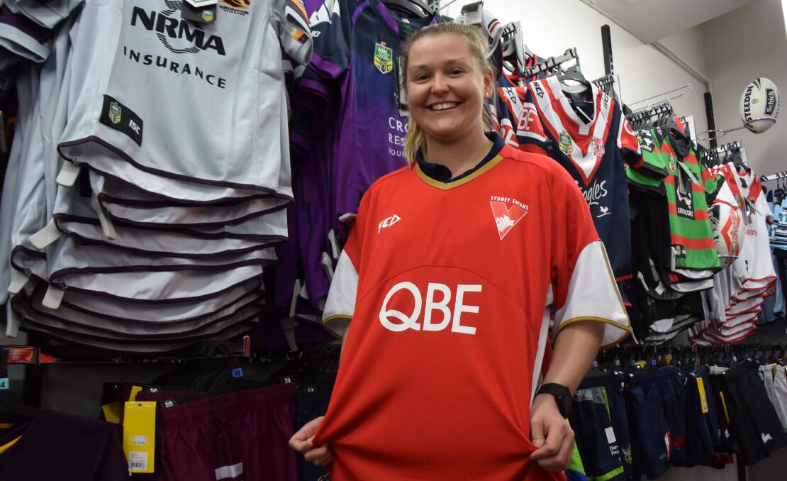 JERSEY GIRL: Kelsey Leaver of Sportsmans Warehouse has plenty of options to choose from ahead of Jersey Day.
