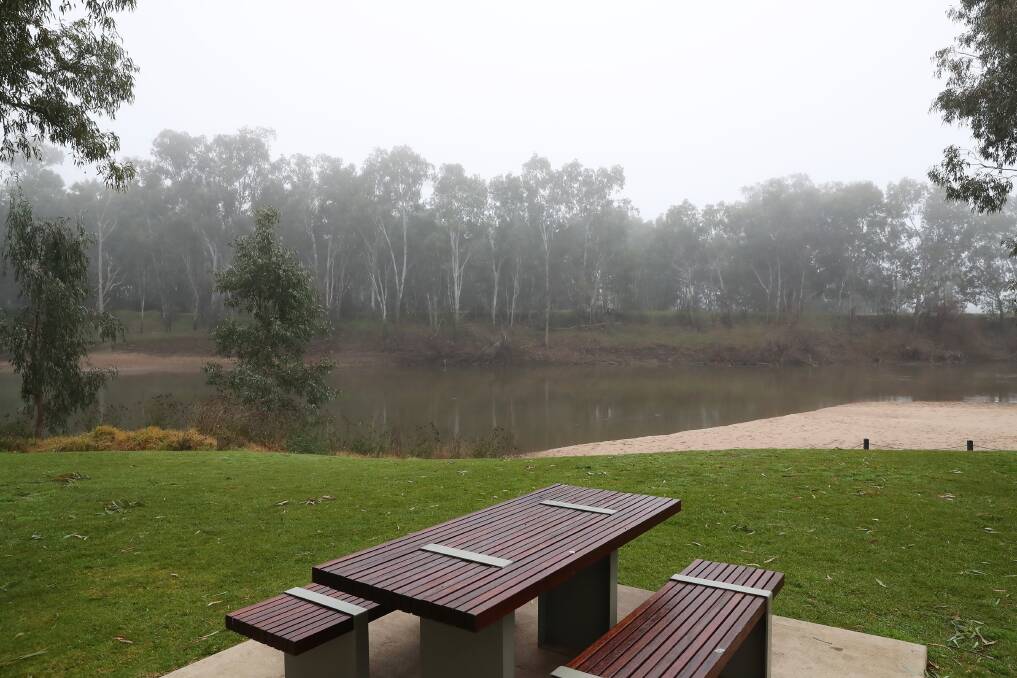 Perhaps a little chilly for a picnic? It looked shivery on the Murrumbidgee River on Monday morning. Picture: Emma Hillier