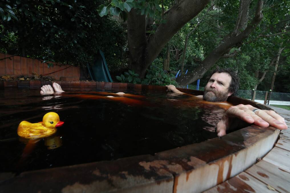 Life gets better if we electrify our homes to solve climate change, says Wollongong engineer Saul Griffith - like using surplus solar power to heat the backyard hot tub -. Picture: ROBERT PEET.