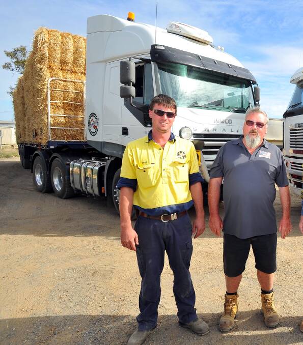 DIRT ROAD DREAMS: Mitch Quade and Stephen Smith lend a helping hand to many struggling farmers in drought-stricken parts of Queensland. Picture: Kieren L.Tilly