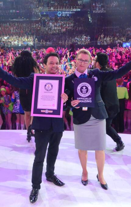 HUGE WIN: Guinness World Records adjudicator Solvej Malouf was on hand to declare the Schools Spectacular as a new record holder. 