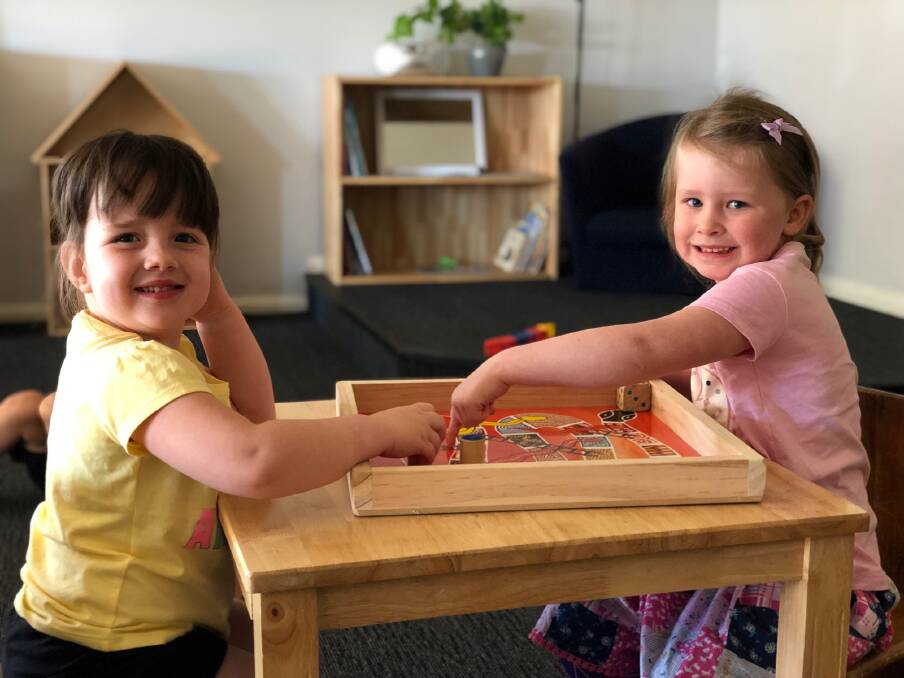Happy environment: Ruby (left) and Hannah enjoying spending time together at the Pe4k Childcare centre in Ashmont.