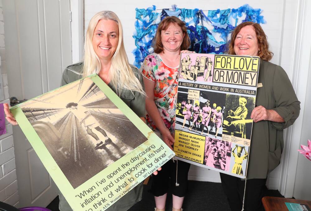 Great team: Wagga Women's Health Centre team members Alison Carr (finance officer), Leah Anderson (specialist counsellor) and manager Gail Meyer with vintage posters from the 70s.