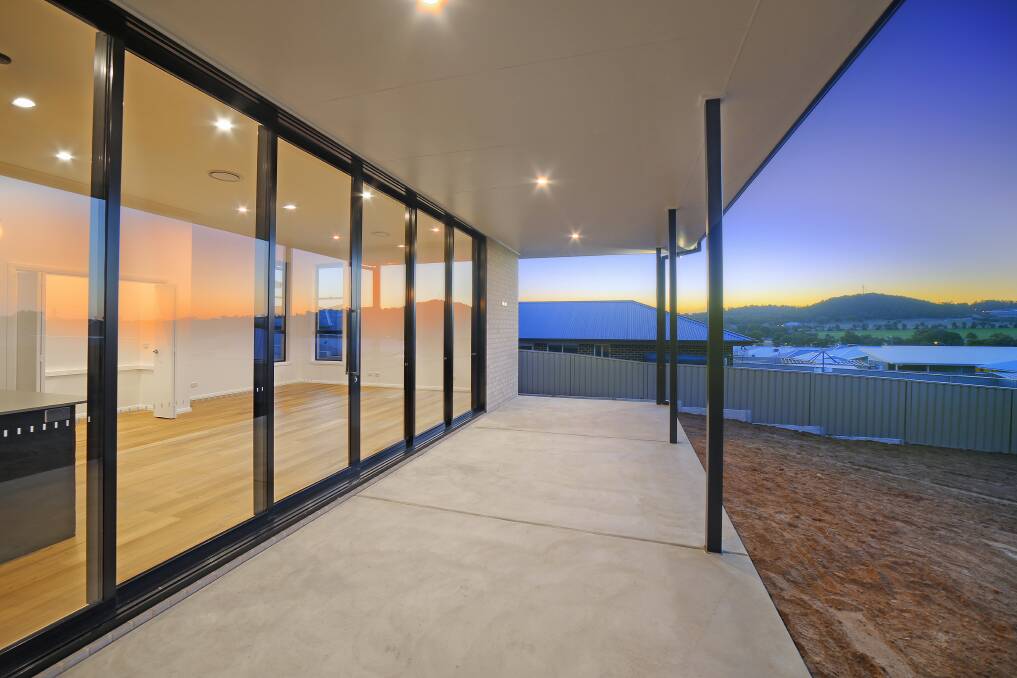 Great views: These impressive large doors from All Glass Wagga help bring the outside in and allow the winter sun to warm the home while also taking in the stunning views.