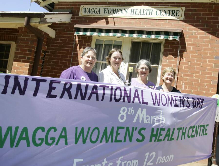 Jan Roberts, founding member Wagga Womens Health Centre Belinda McMahon, Beverley Shaw and Gail Meyer preparing for International Women's Day in 2006.