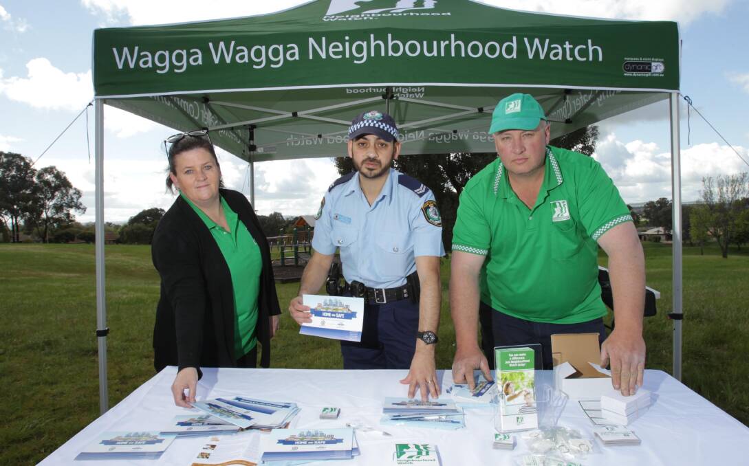 WATCH OUT:  Nicole Eggleton, Wagga police Senior Constable Peter Narouz and Wayne Deaner in Kooringal on Monday. Picture: Les Smith