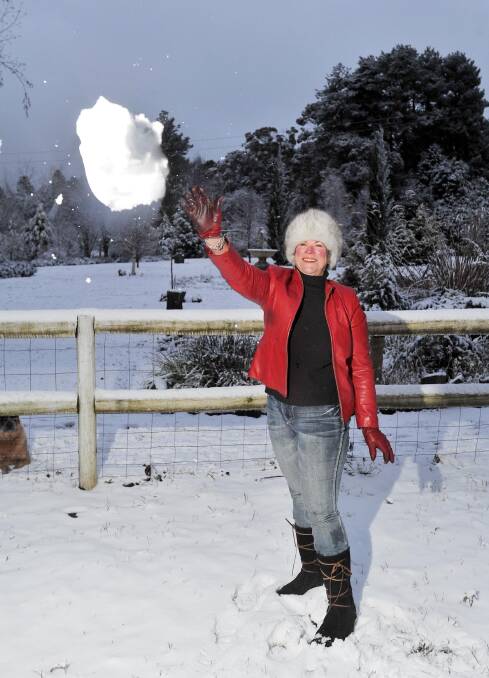 LET IT SNOW: Laurel Hill resident Roslyn Kamradt took in the best the cold freeze and thick snow had to offer. Picture: Kieren L. Tilly