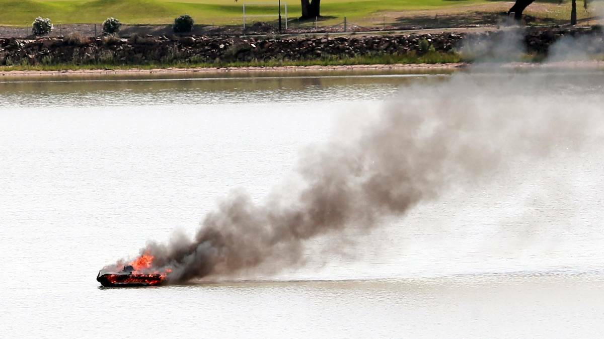 EXPLOSION: Four people swam to safety after their boat exploded in Lake Albert on November 20. 