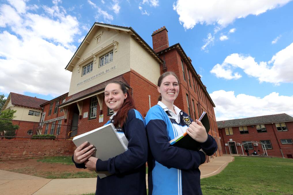 Wagga High School year 12 students Makenna Lucas and Matilda O'Connor can see the end of exams in sight and are feeling mixed emotions about life beyond the school gates. Picture: Les Smith 
