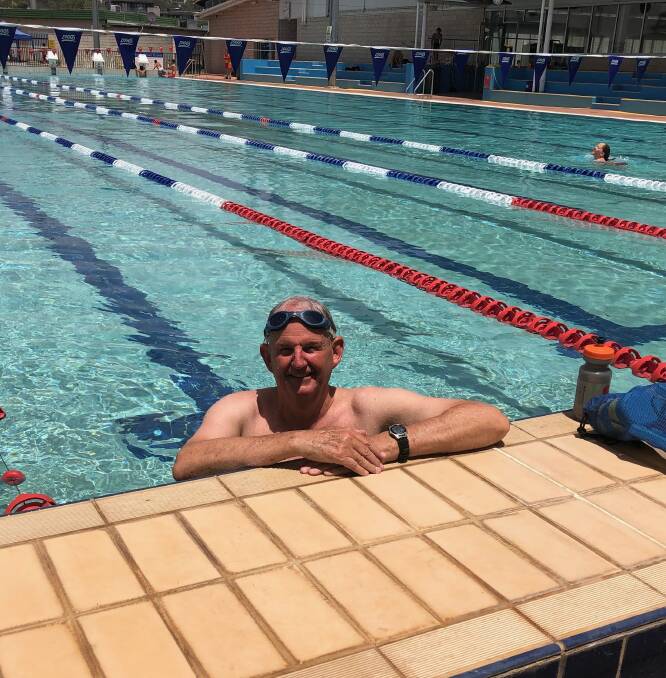 COOLING OFF: Wagga mayor Greg Conkey opens the doors to Oasis Aquatic Centre doors when the mercury hits 41 degrees. Picture: Jess Whitty