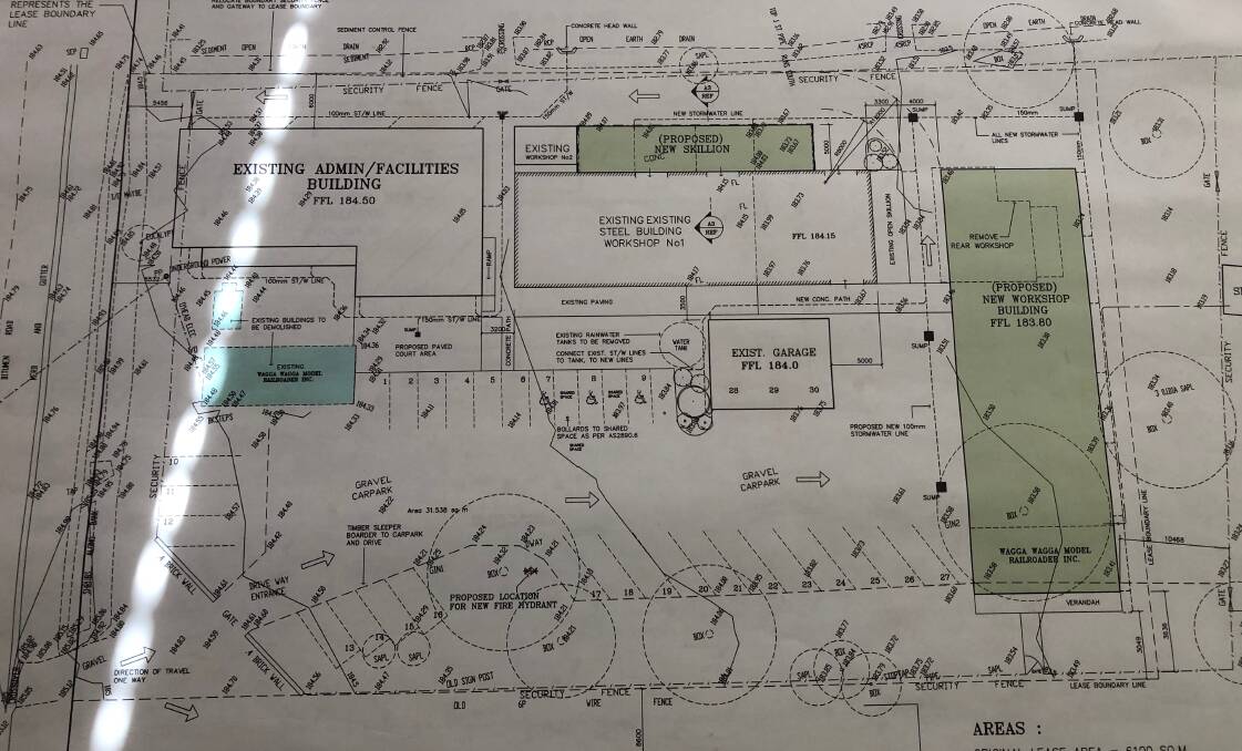 Plans of the new shed, highlighted in green, and the blue box to the left which accommodates the Model Railroaders will be removed. 