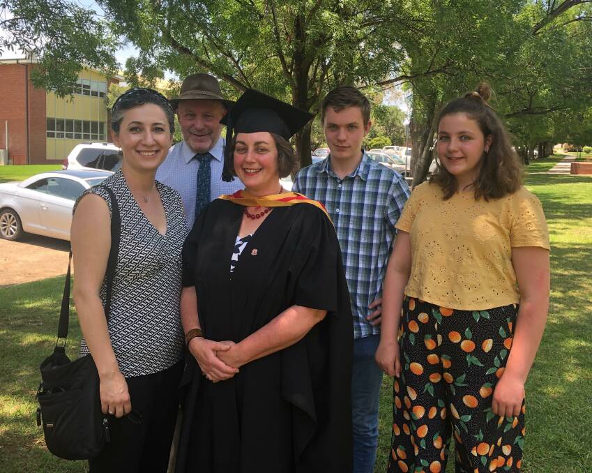CONGRATULATIONS: Monica Dickson graduated with a Master of Animal Science at Wagga's CSU alongside her support team, Associate Professor Shokoofeh Shamsi, her husband Tim and children Geordie, 16, and Maeve, 13. 