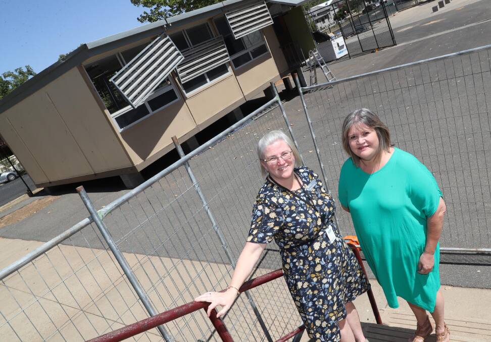 JOURNEY: Director of educational leadership Jenene McGrath and Wagga Public School principal Leanne Harvey in front of the first portable classroom being installed. Picture: Les Smith