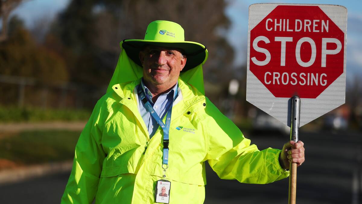 SCHOOL'S BACK: Wagga students went back to school yesterday for term 3 and Lutheran Primary School's supervisor Alan Rolla says it's about respecting all road users.