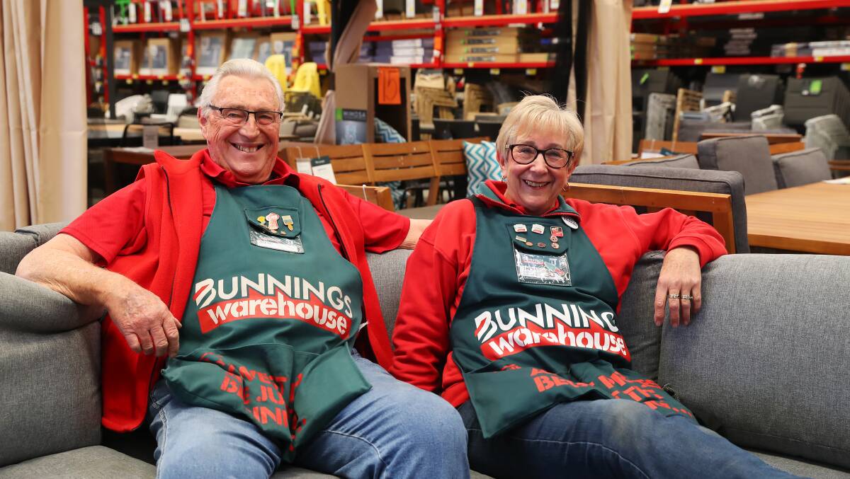 KEEPING BUSY: Wagga's Bunnings Warehouse team members Allan Fleischer and Shirley Smith are all smiles at work. Picture: Emma Hillier