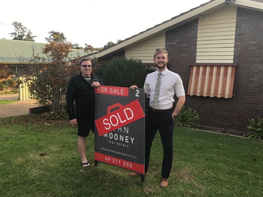 SOLD: Wagga resident Brandon Sanbrook (R), 22, chose to spend his savings on a Kooringal unit that was being sold by Tony Rice. Picture: supplied