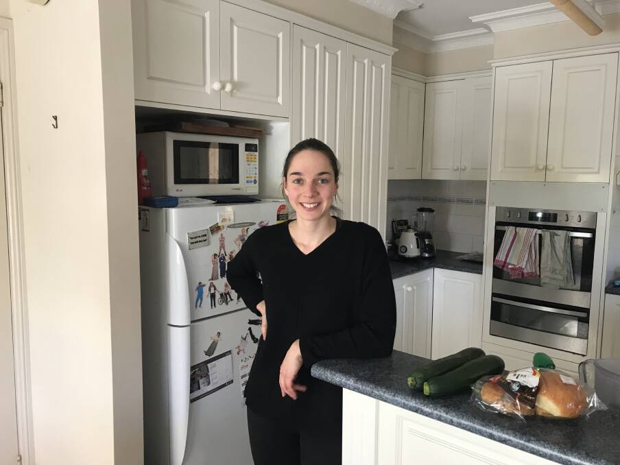 NOT PHASED: Current renter and university student Alice Debney argued for more flexibility with pets in future tenancy reforms, with picture hooks not a priority. Picture: Jess Whitty