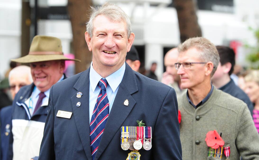 Kevin Kerr walks in the Wagga Anzac Day march and service, 2017. 