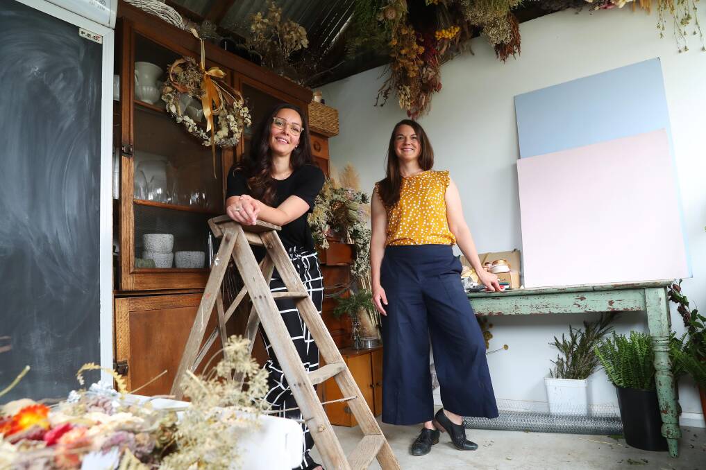 LENDING HAND: Bethany Saab and Sophie Kurylowicz behind Little Triffids Flowers receive an extra boost to push past challenges faced by small business owners. Picture: Emma Hillier
