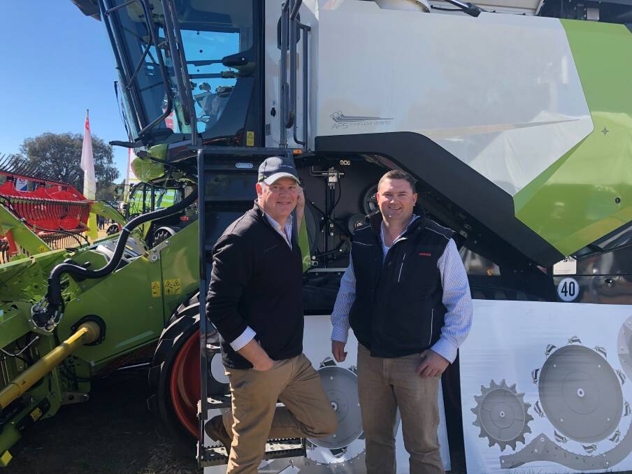 INTRODUCING: CLAAS Lexion 8000 series makes its debut at the Henty Machinery Field Days. National product manager for Lexion Steve Reeves is with Wagga branch manager Andrew Kearns. 