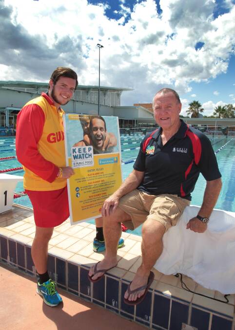 Oasis lifeguard Nick Murphy with Oasis manager Maurice Eames. 
