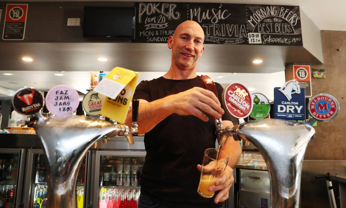 PERFECT POUR: William Farrer Hotel owner David Barnhill is satisfied and says he loves the hospitality industry, even after 19 years. Picture: Emma Hillier 