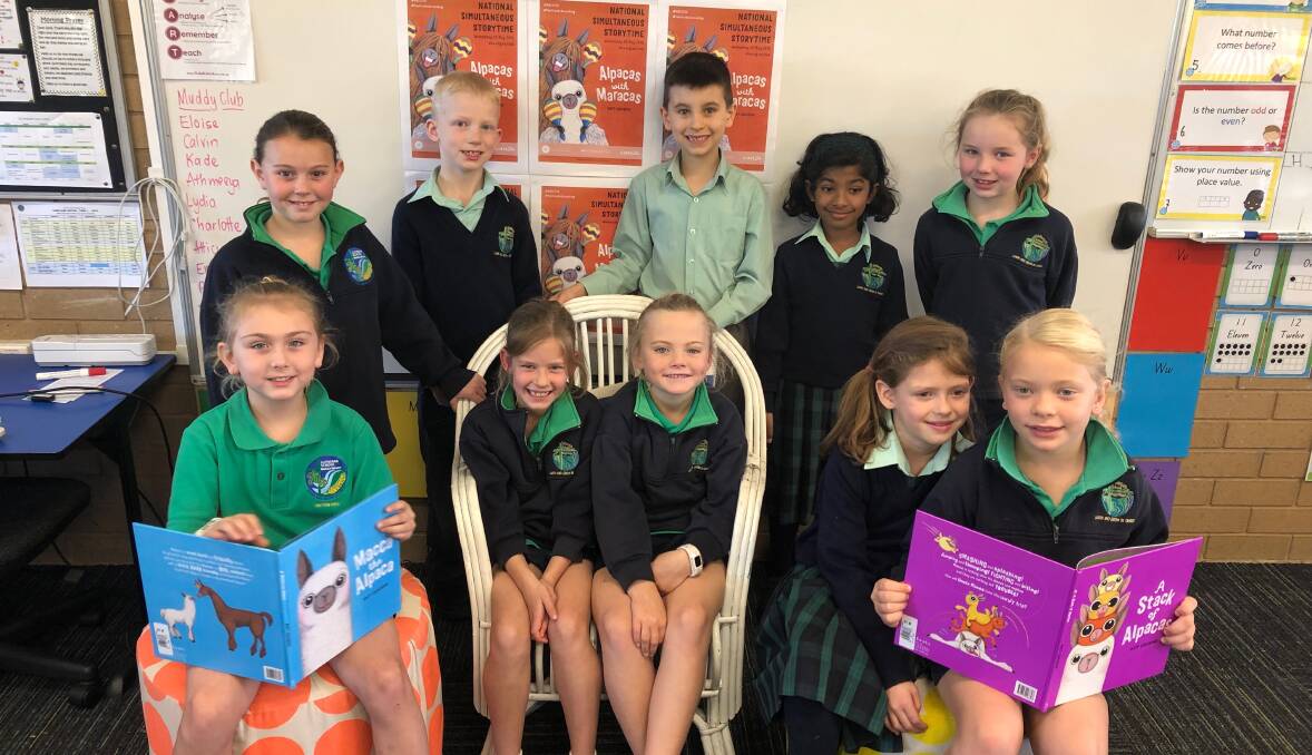 OPEN BOOKS: Lutheran Primary School's year 2 students (BL) Pippen Cook, 7, Tasman O'Hara, 7, Calvin Koznik, 7, Lydia Philip Cheriyan, 7, Annabelle Hibbarb, 7, (FL) Willow Greenway, 7, Maisie Hughes, 7, Chelsea Reynolds, 7, Adelaide Callinan, 7, and Summer Battenally, 7, say the book was funny. Picture: Jess Whitty