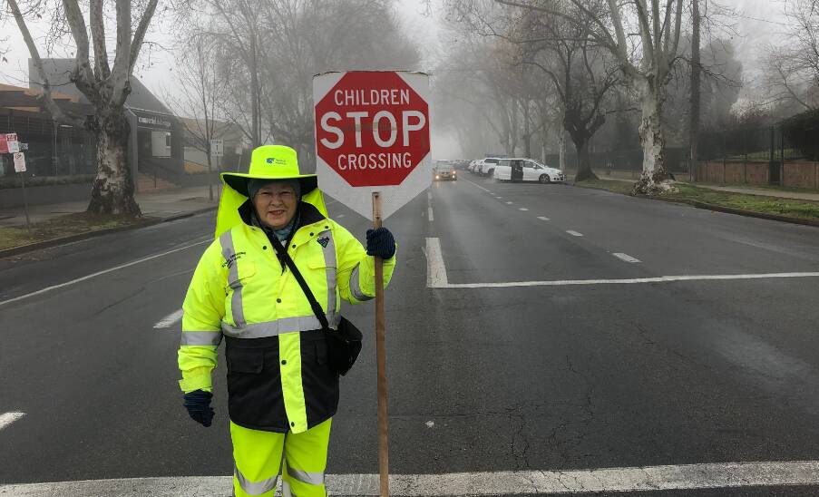 HIGH-VIS: Wagga Public School Gurwood Street crossing supervisor Catherine McLeod has been a lollipop for about 20 years. Picture: Jess Whitty