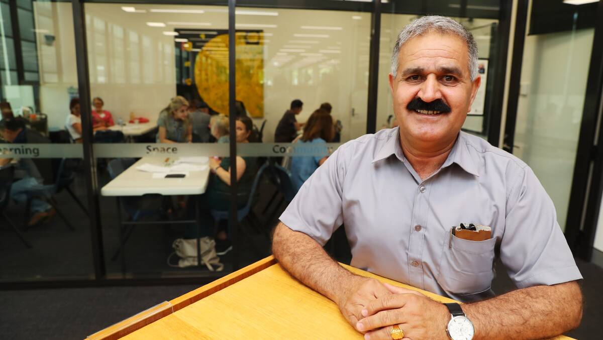 HELPING HANDS: Ahmed Qasim, originally from Iraq, says the Language Cafe is not just improving his English but is also an opportunity to socialise and build confidence. Picture: Emma Hillier