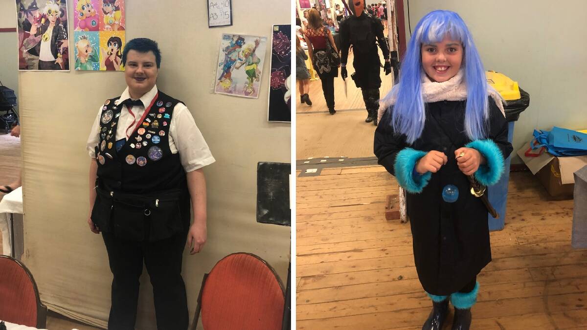 LIVING A FANTASY: Canberra comic and print artist Cas Imber and Coolamon's Lily Rose, 10, dressed up as Rimuru Tempest. Pictures: Jess Whitty