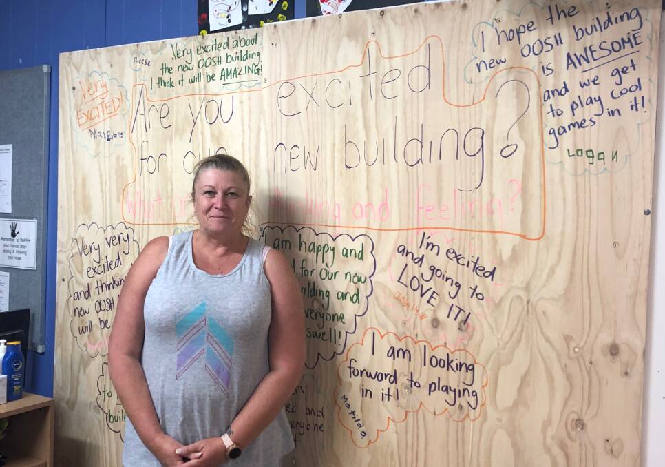 STANDING PROUD: Forest Hill Outside School Hours committee president Angela Elphick says it has been rewarding to lead a project that will unite the community together. She is standing out the front of the new entrance that will come down on Thursday. 
