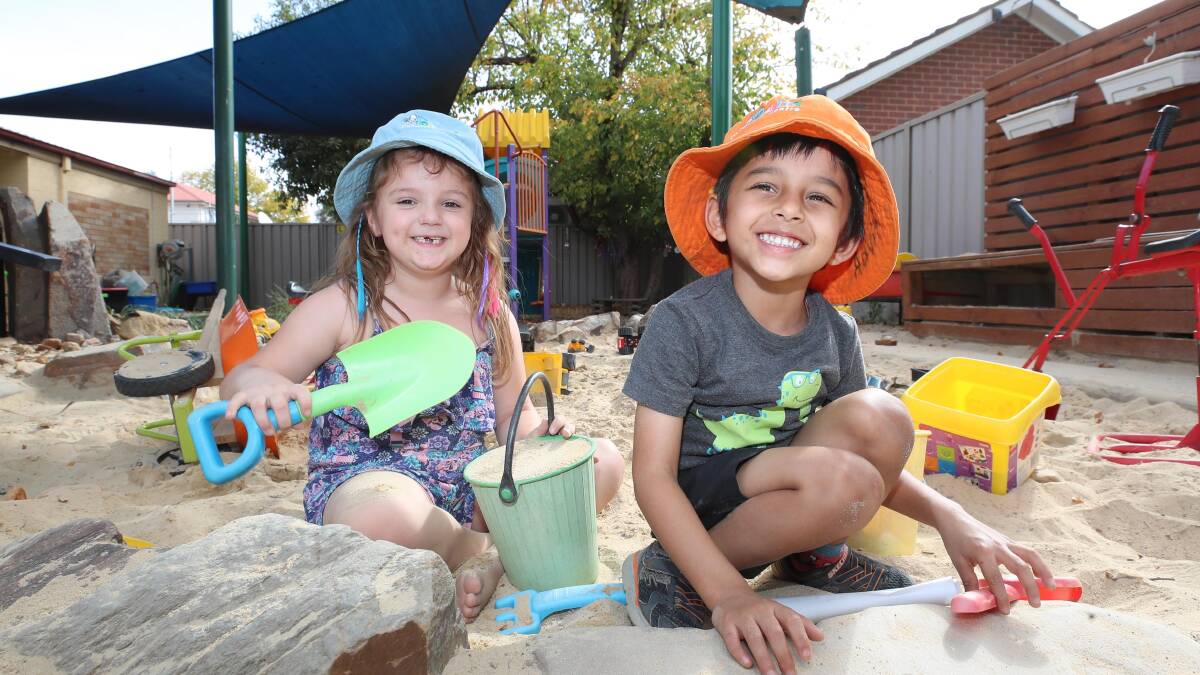 PLAY TIME: Possums Playground Occasional Child Care Centre group children Peyton-Grace Walsh, 5, and Advit Bhagwat, 4, are enjoying the sandpit. Picture: Les Smith