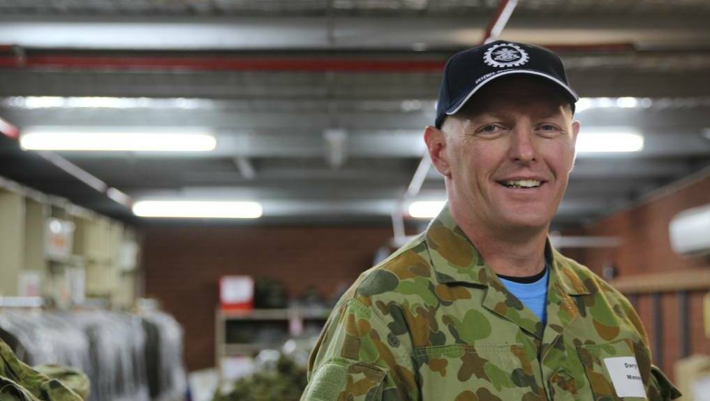 Tables turned: Fire and Rescue NSW Turvey Park duty commander Inspector Daryl Manson takes on a fresh challenge at Kapooka as part of the annual VIP Challenge in 2018. 