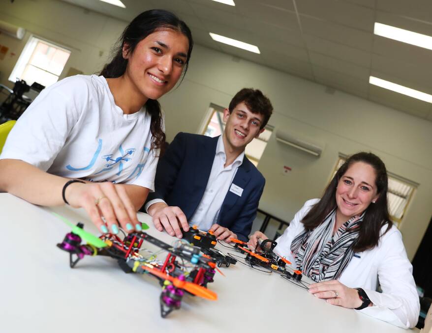 DRONE DAY: Mahla Kafami and Sam Lewinson from JAR Education and KCC teacher, Jenny Watt at the workshop to increase teacher capabilities and students' interest in coding and programming industries. Picture: Emma Hillier
