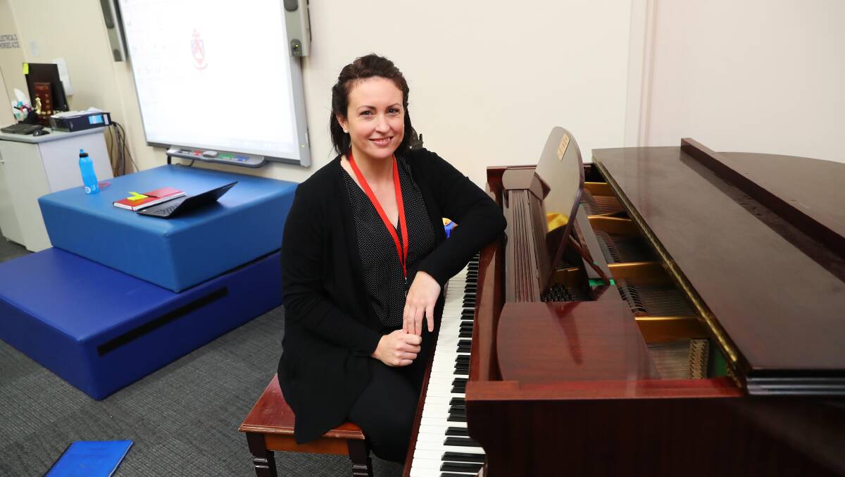 NEVER SAY NEVER: St Joseph's drama and music teacher Mrs Monica Langtry said she is all about giving everything a go as you don't know where life will take you. Picture: Emma Hillier