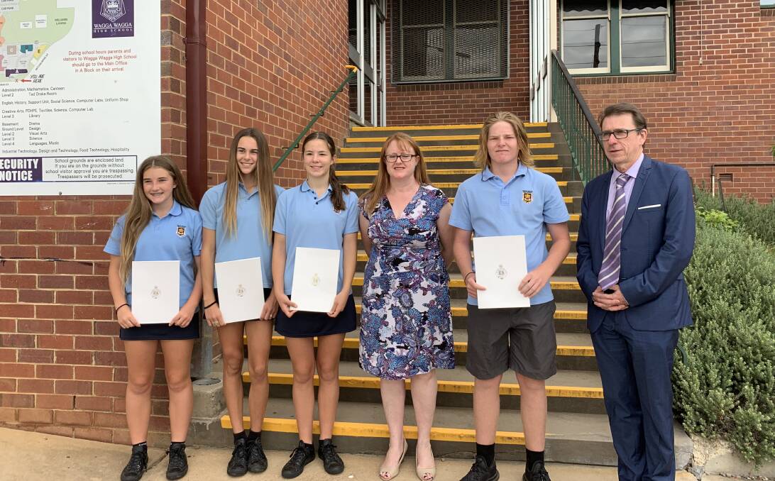 Wagga High School students Milly Lucas, Leila Wadley and Maisy Condon, deputy principal Tania Maddison, student Declan Rohrich and Wagga MP Dr Joe McGirr. Picture: supplied