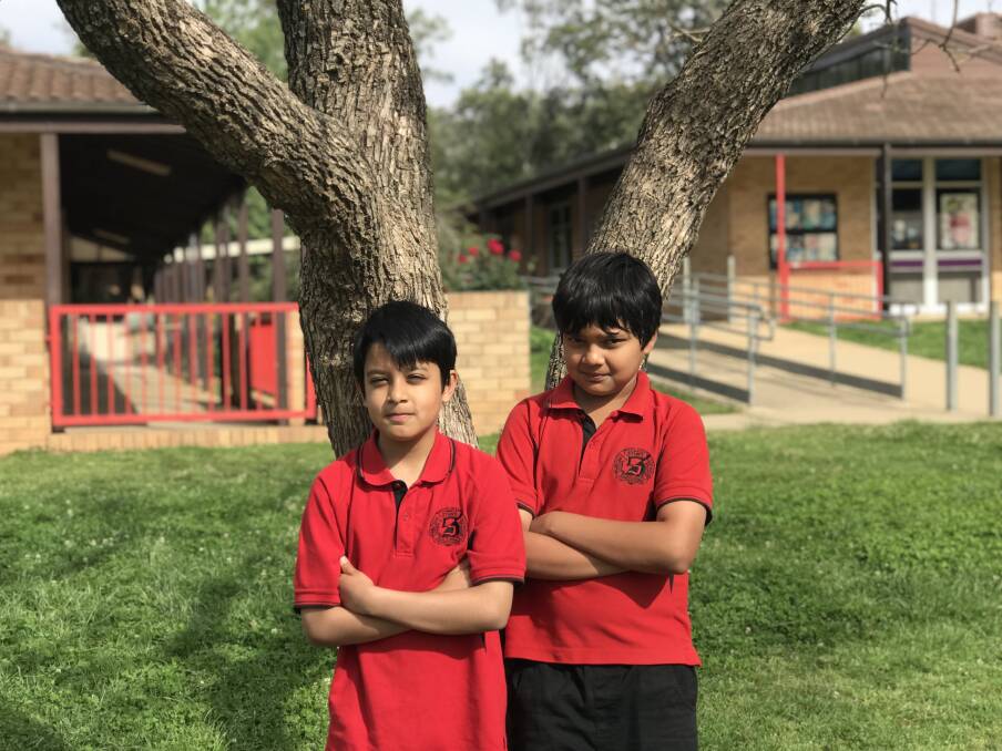 BRING IT ON: Sturt Public School students Mustafa Hussain, 11, and Raaid Mahbub, 10, are busy preparing for the Premier's Spelling Bee by practising outside of school hours.  Picture: Jess Whitty