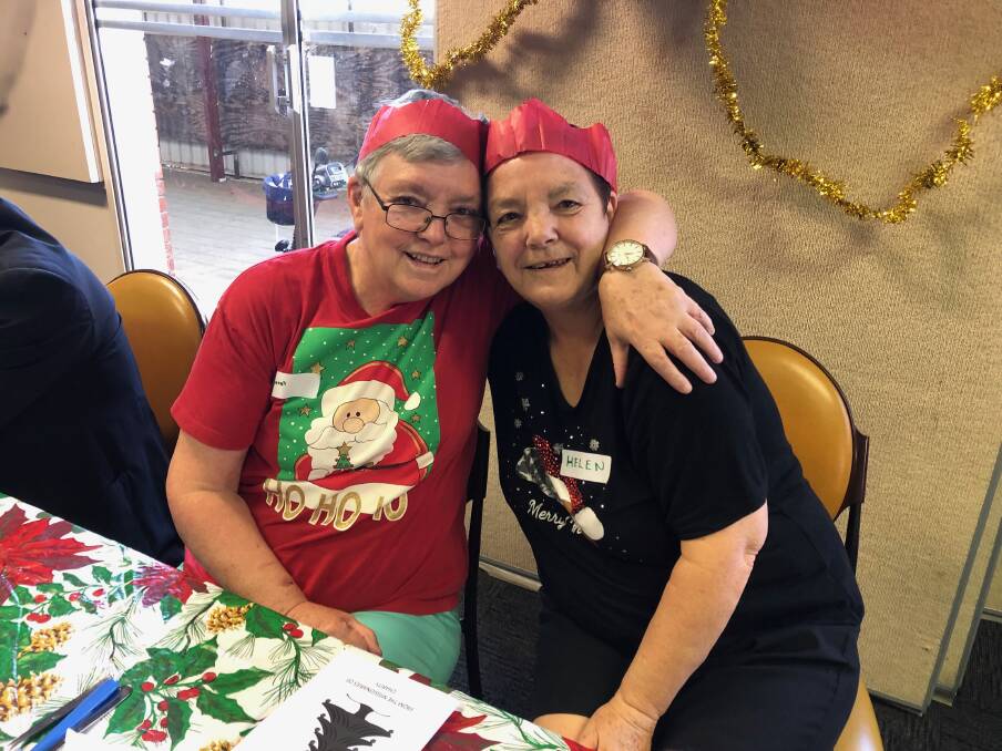 CLOSE FRIENDS: Margaret White and Helen Davidson have been coming to the Parish community lunch for five years and said it is a "special day". Picture: Jess Whitty