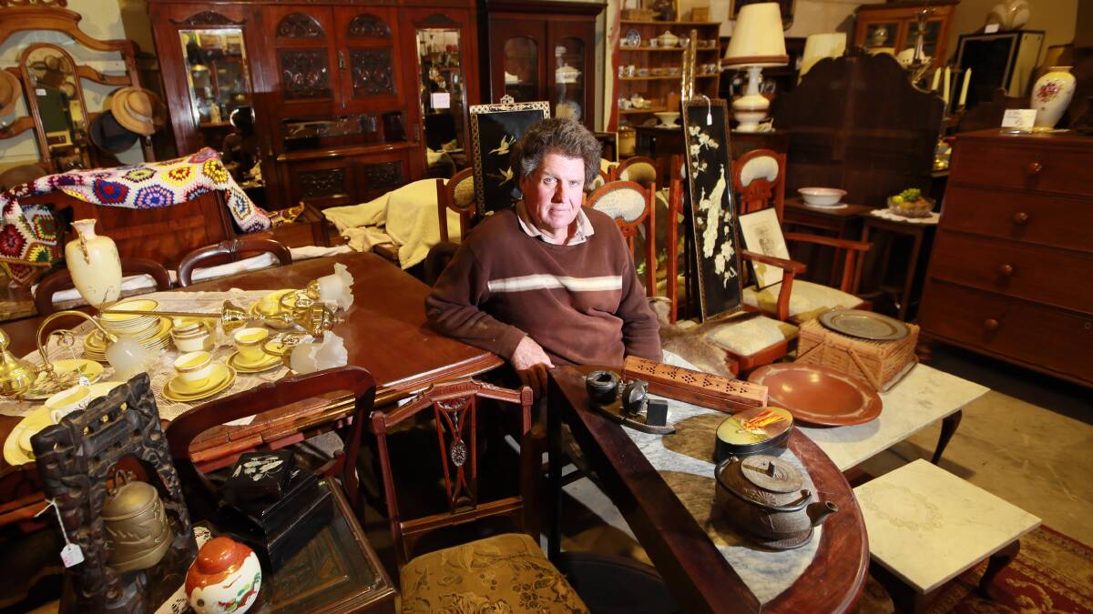 MOVING ON: John Gilfillan has been running the pop-up shop, selling thousands of antique furniture, for more than a year and says it's time to move on and focus on his biggest project. Picture: Les Smith 