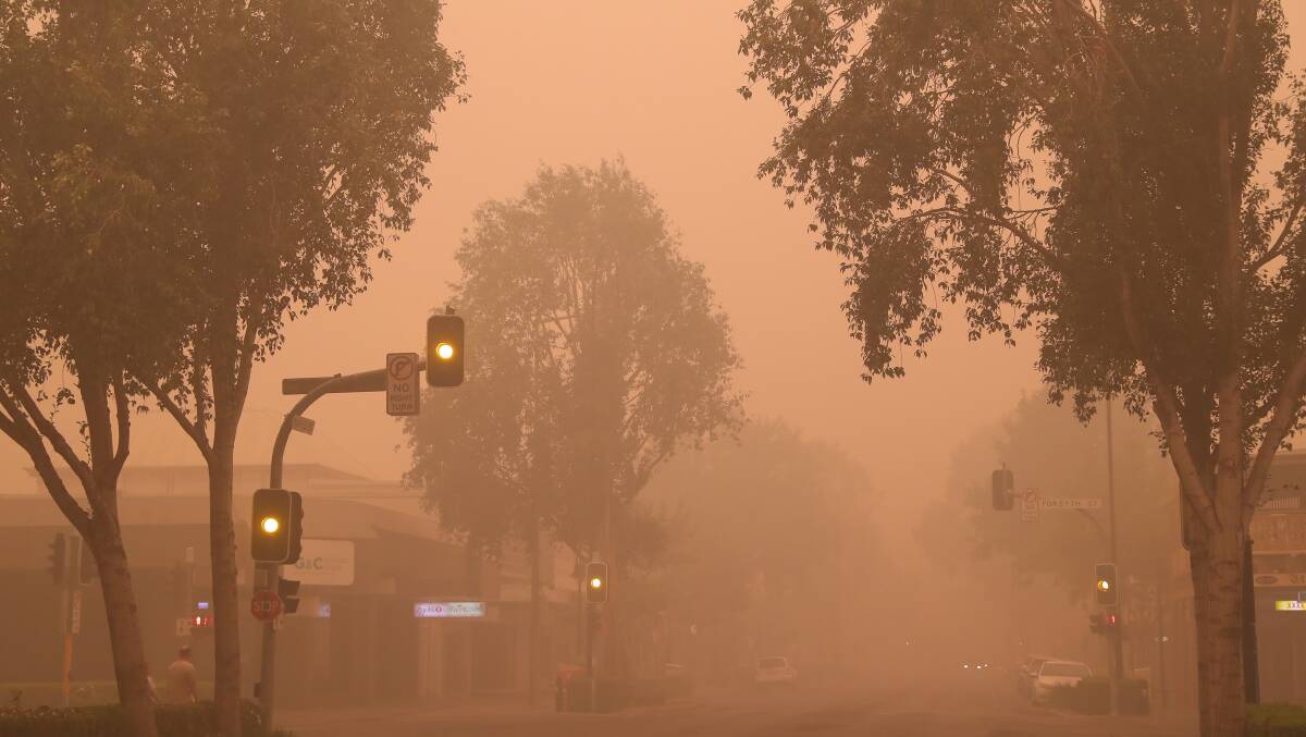 GHOST TOWN: Wagga's main street quiet as people hide indoors away from the thick smoke that blanketed the city on Saturday, January 4. Picture: Emma Hillier