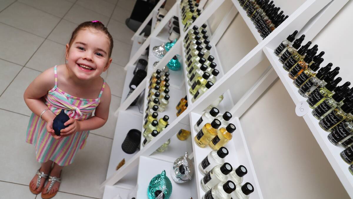 SHOP LOCAL: Sarah Maloney Handmade Home Fragrance's little helper Georgia, 4, shows that when you support local businesses that creates opportunities for families to support others. Picture: Emma Hillier